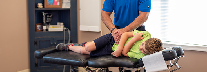 chiropractor sees children for wellness chiropractic care